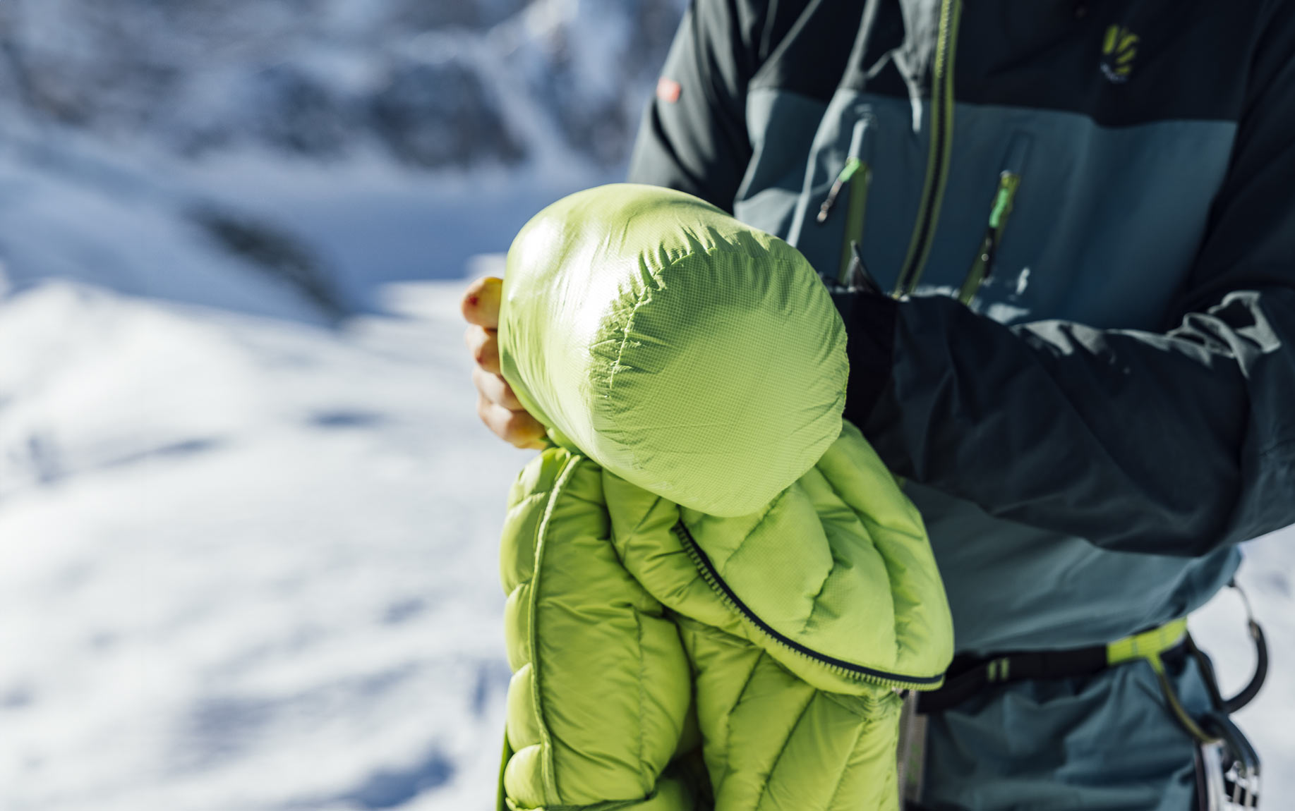 Compressible down jacket for alpine climbing